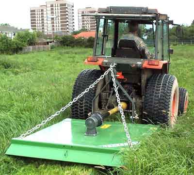 Grass topper for compact tractor